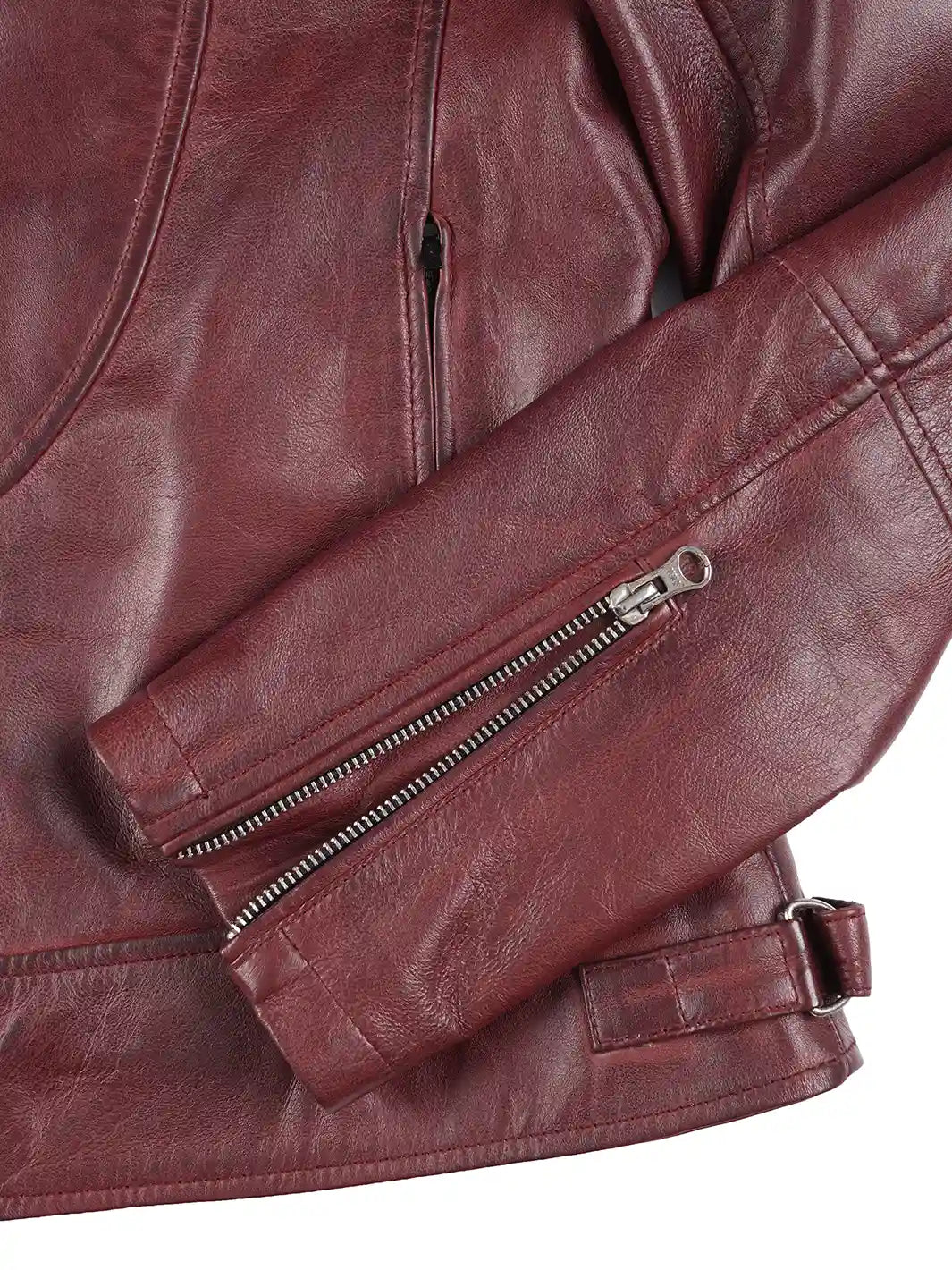Close-up of a brown leather jacket with a zipper on a white background